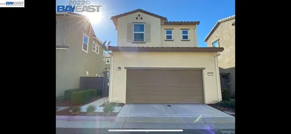 a front view of a house with a garage