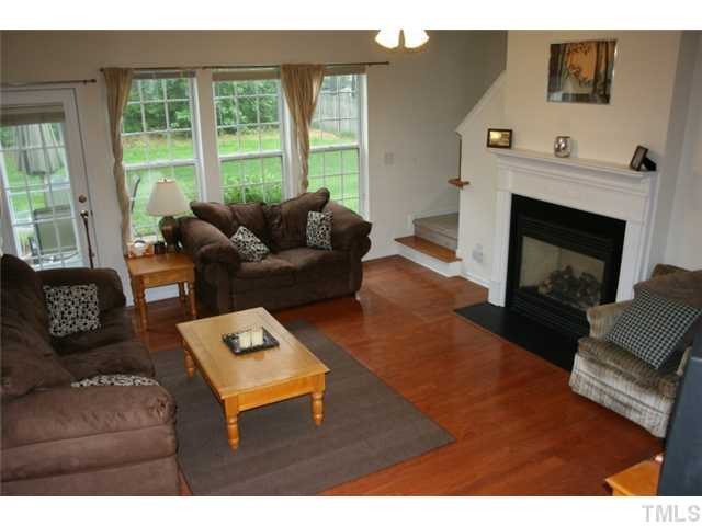 310 Burrell Road Durham, NC 27703 - Photo 5 of 21 Open layout downstairs that maximally allows the sun to shine through; great natural light. Hardwood floors throughout downstairs. Den/Family/Great Room