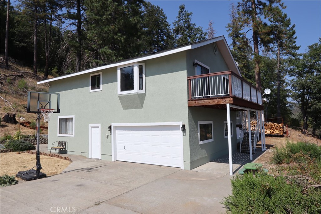 a front view of a house with a garage