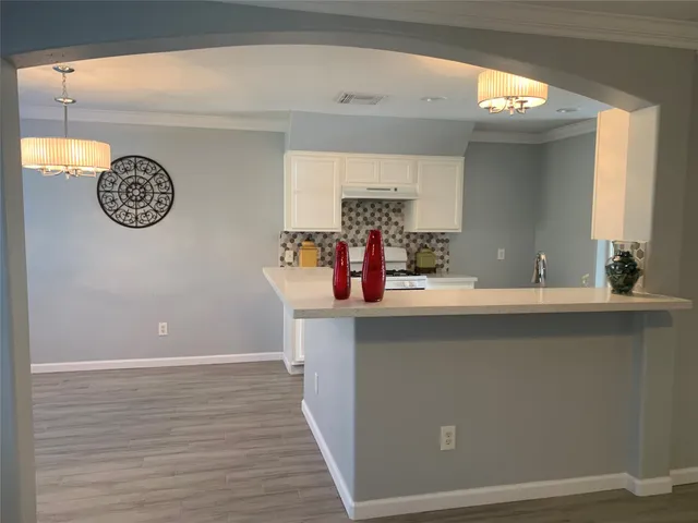 a view of a livingroom with a chandelier