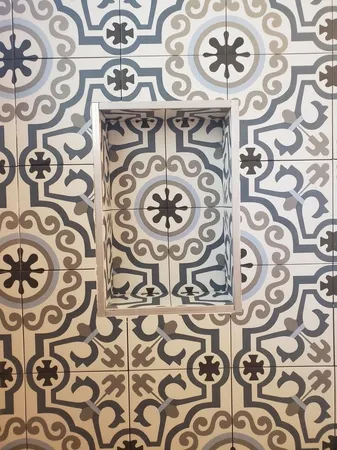 a bathroom with a window and a shower curtain