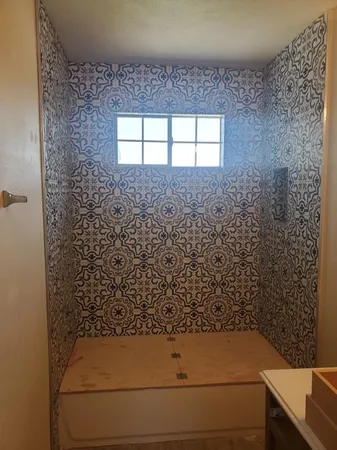 a view of a hallway to a closet