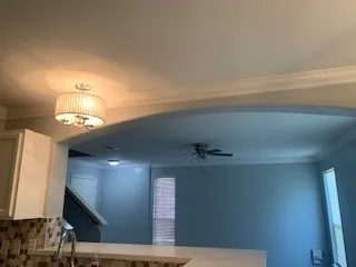 a view of a porch with a chandelier