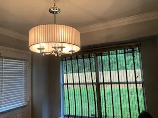 a view of room with wooden floor