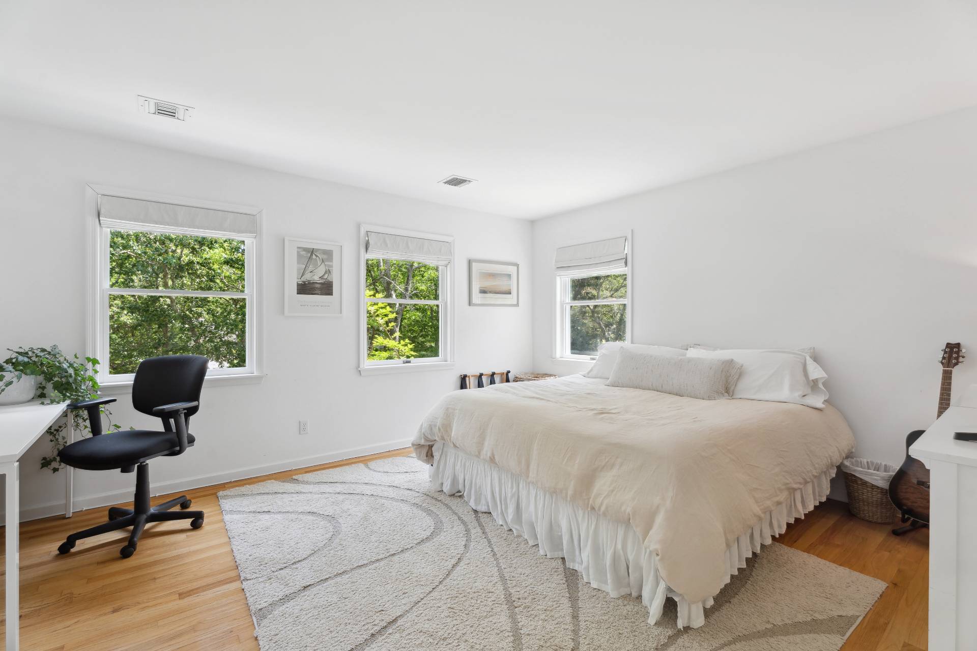 29 Emerson Place Sag Harbor, NY 11963 - Photo 13 of 23 a bedroom with a bed and a window