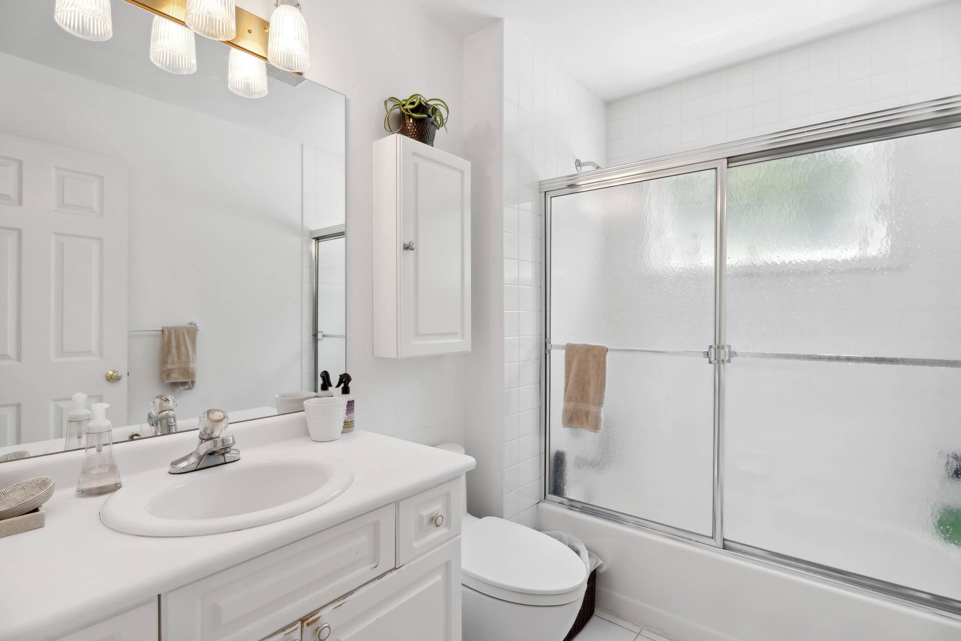 29 Emerson Place Sag Harbor, NY 11963 - Photo 14 of 23 a bathroom with a sink toilet and shower