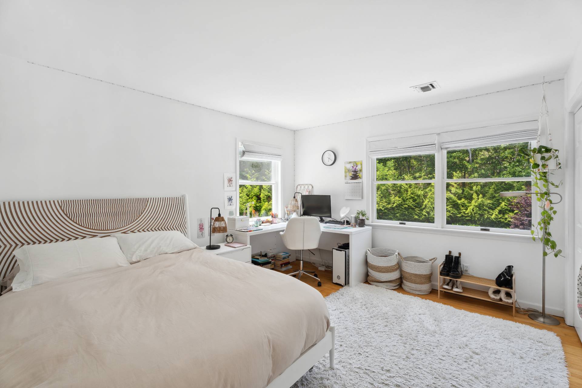 29 Emerson Place Sag Harbor, NY 11963 - Photo 16 of 23 a bedroom with a bed and a large window