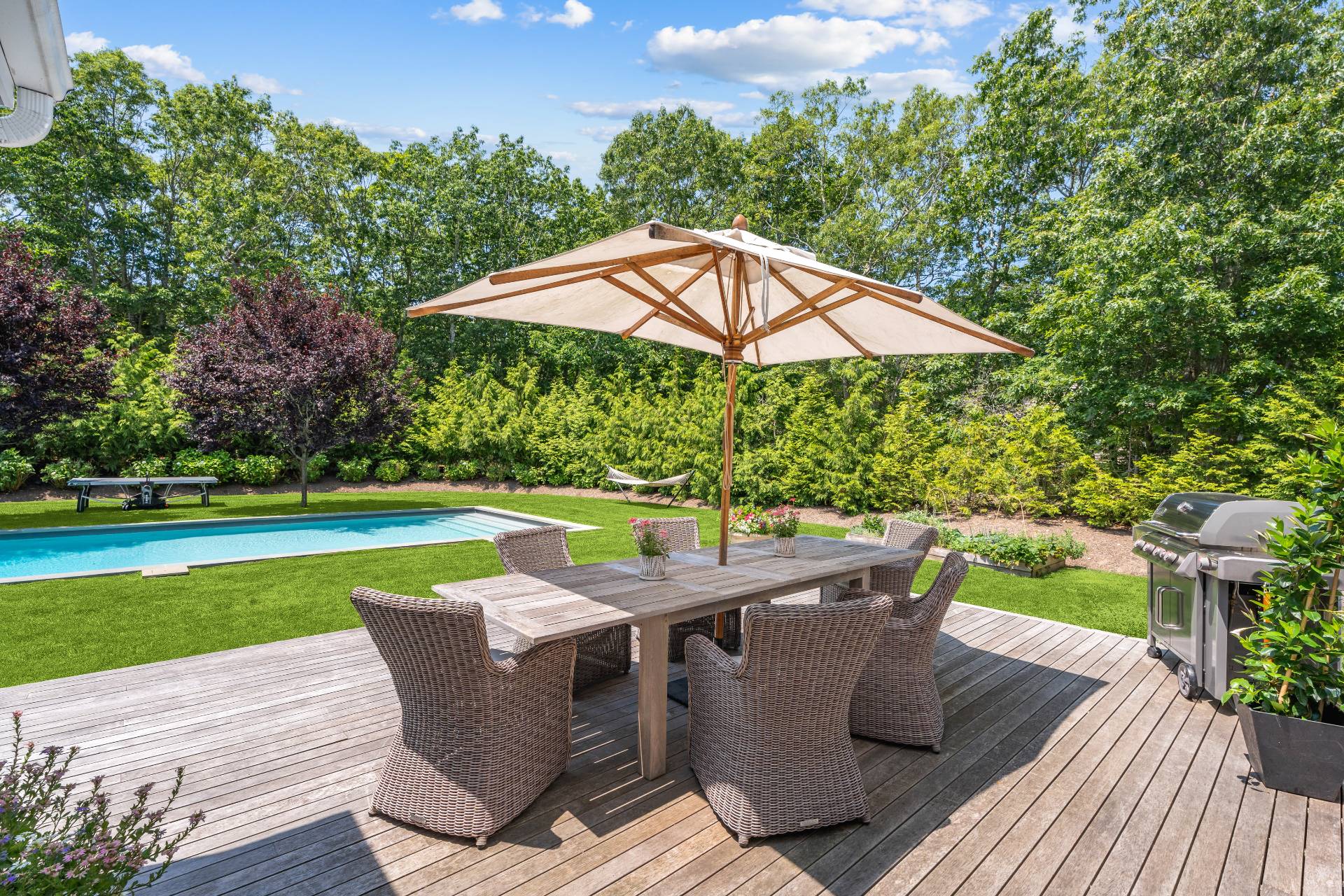 29 Emerson Place Sag Harbor, NY 11963 - Photo 20 of 23 a patio with wooden floor table and chairs