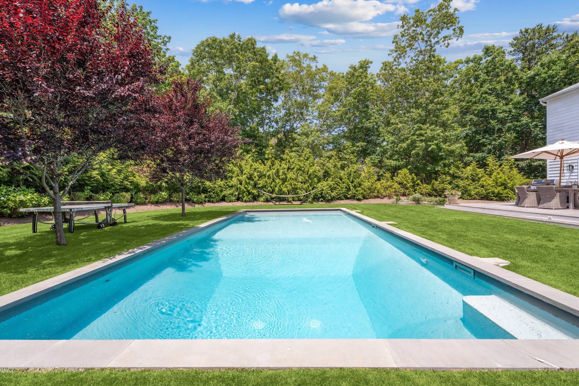 29 Emerson Place Sag Harbor, NY 11963 - Photo 21 of 23 a view of a yard with large trees