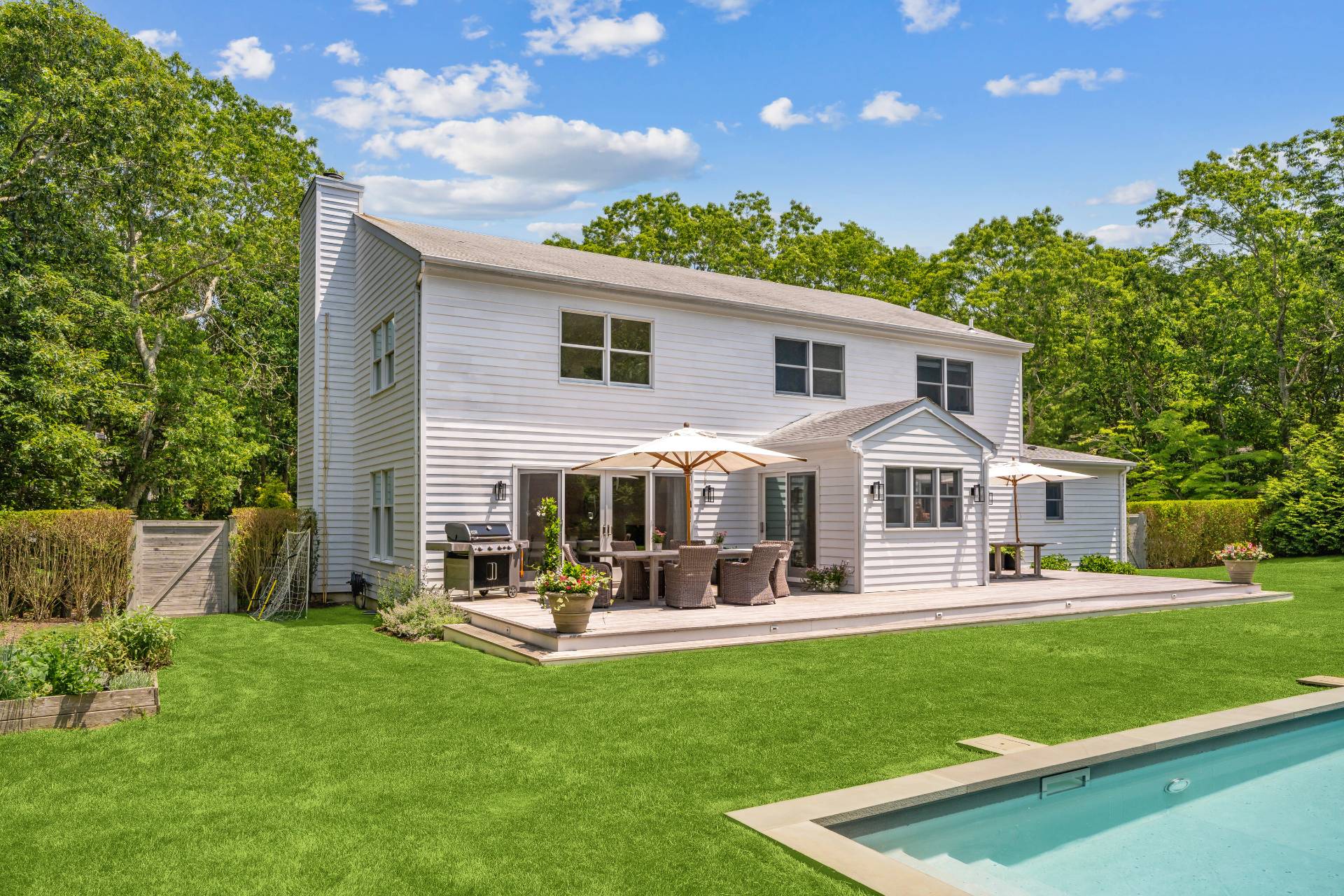 29 Emerson Place Sag Harbor, NY 11963 - Photo 22 of 23 a front view of house with yard and outdoor seating