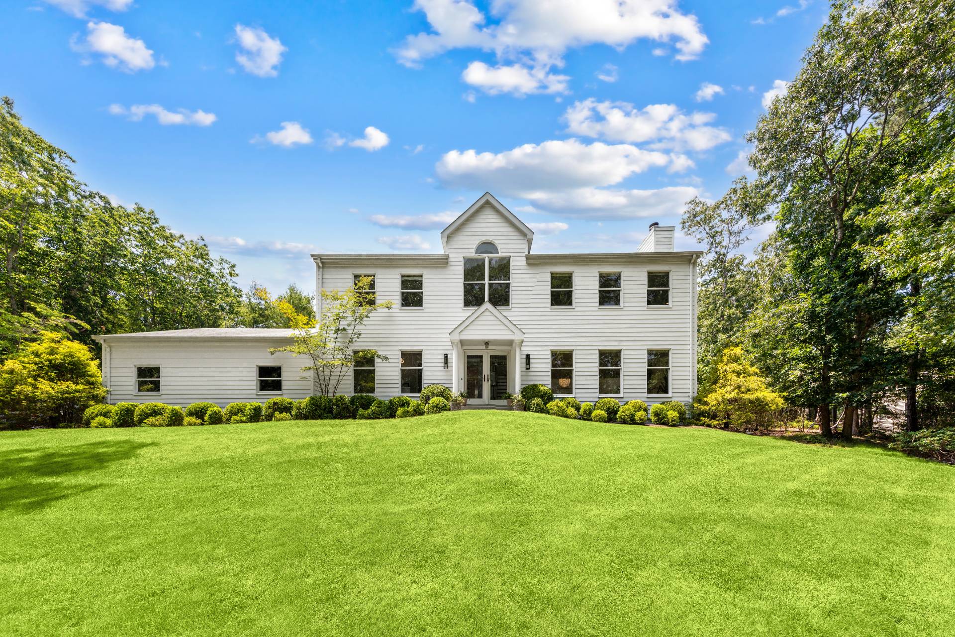 29 Emerson Place Sag Harbor, NY 11963 - Photo 4 of 23 a front view of a house with a yard