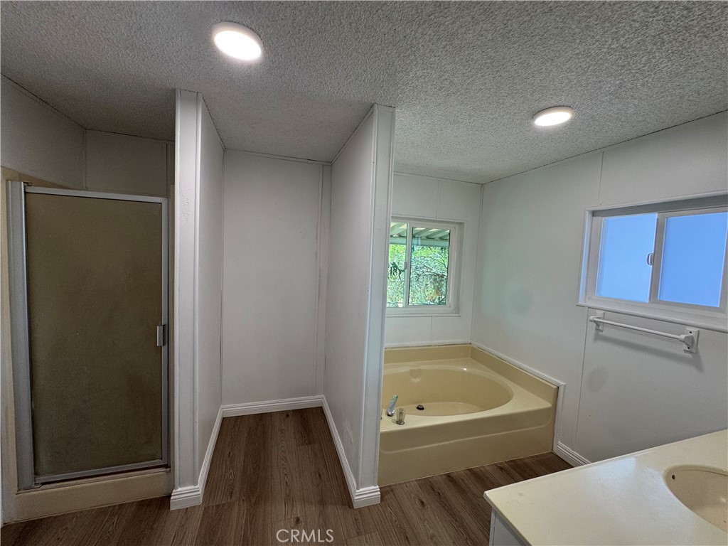 37065 Bonita Vista Road Anza, CA 92539 - Photo 11 of 65 a bathroom with a tub and toilet