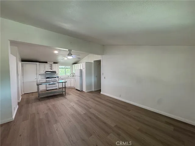 a view of a livingroom with a flat screen tv