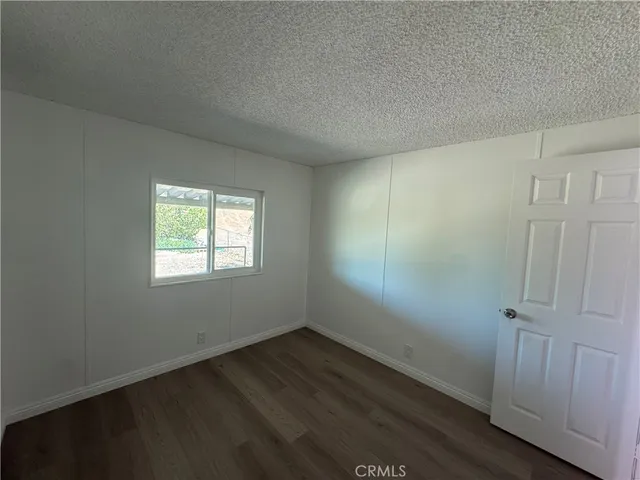 a storage room with wooden floor