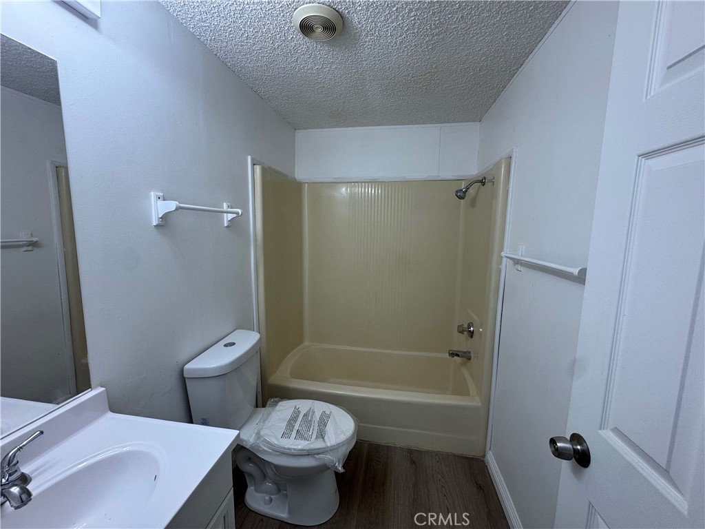37065 Bonita Vista Road Anza, CA 92539 - Photo 33 of 65 a bathroom with a sink a toilet and shower