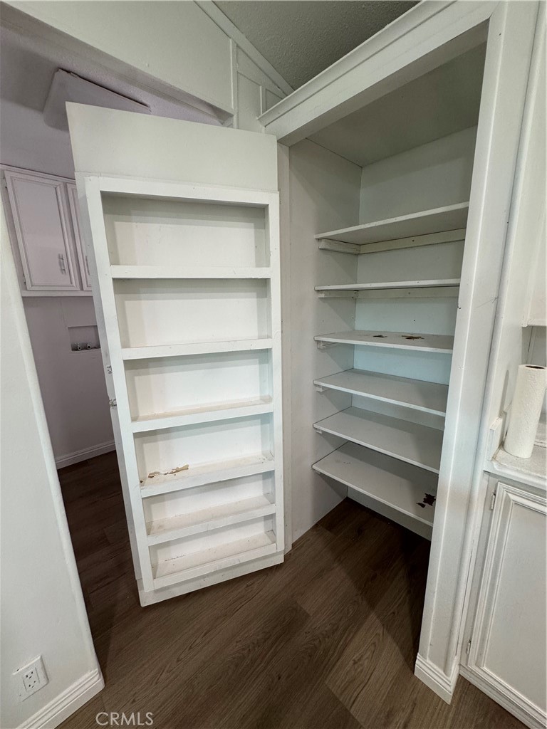 37065 Bonita Vista Road Anza, CA 92539 - Photo 34 of 65 a storage room with wooden floor