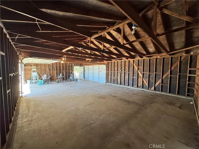 a view of a lake with houses in the background