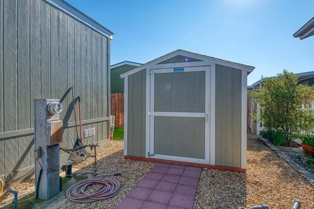 a view of outdoor space and wooden deck
