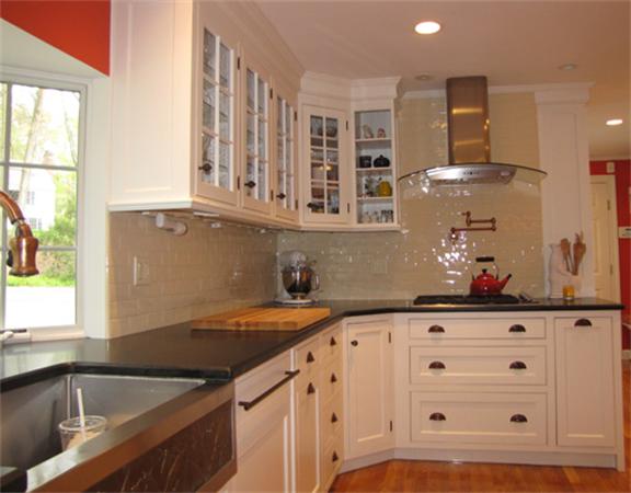 53 Temple Road Wellesley, MA 02482 - Photo 8 of 20 a kitchen with granite countertop a sink and a stove