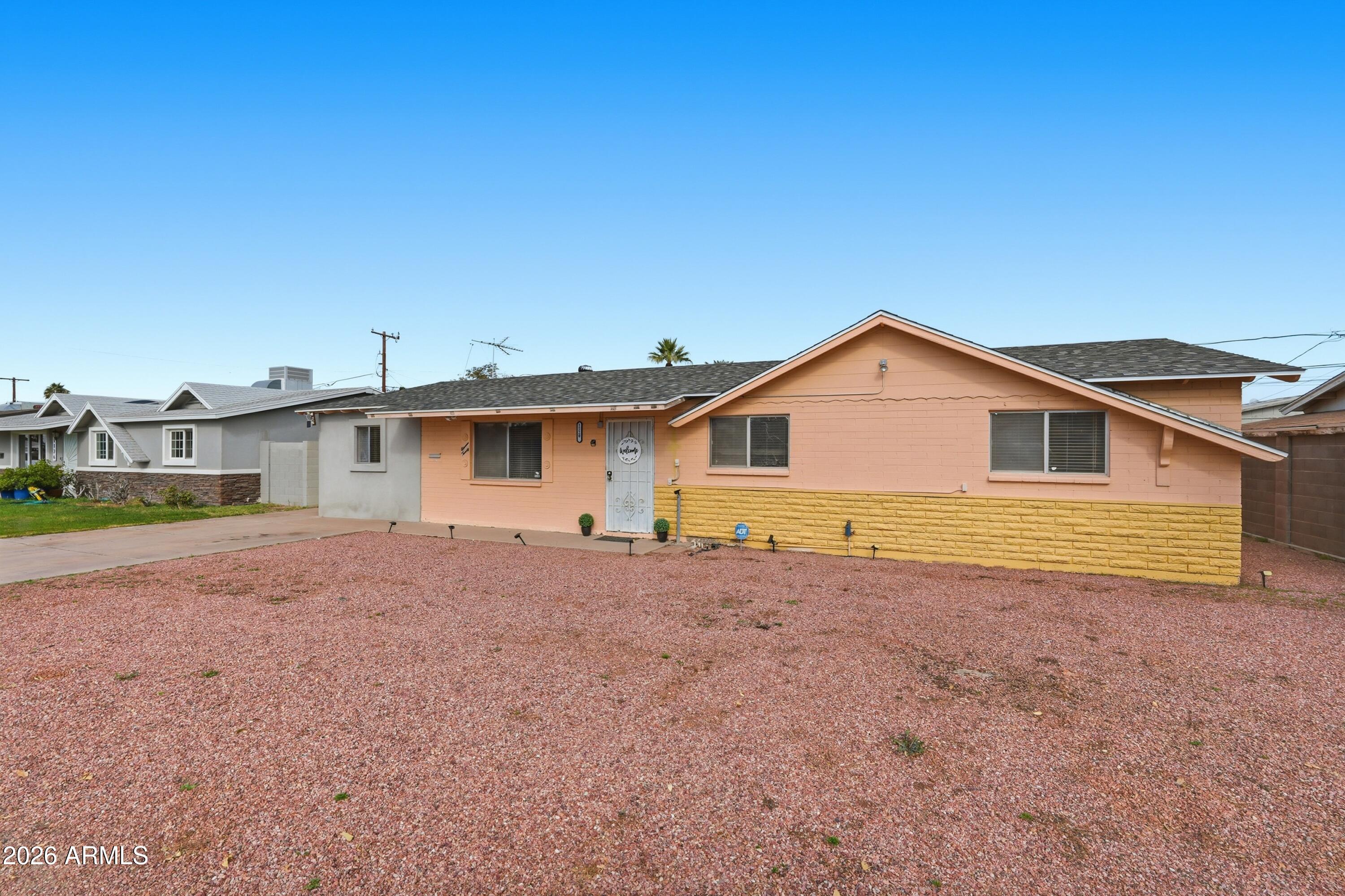 1120 West Romo Jones Street Tempe, AZ 85281 - Photo 18 of 18 a view of a house with a backyard