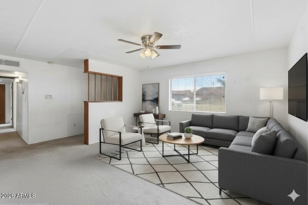 1120 West Romo Jones Street Tempe, AZ 85281 - Photo 2 of 18 a living room with furniture and a window