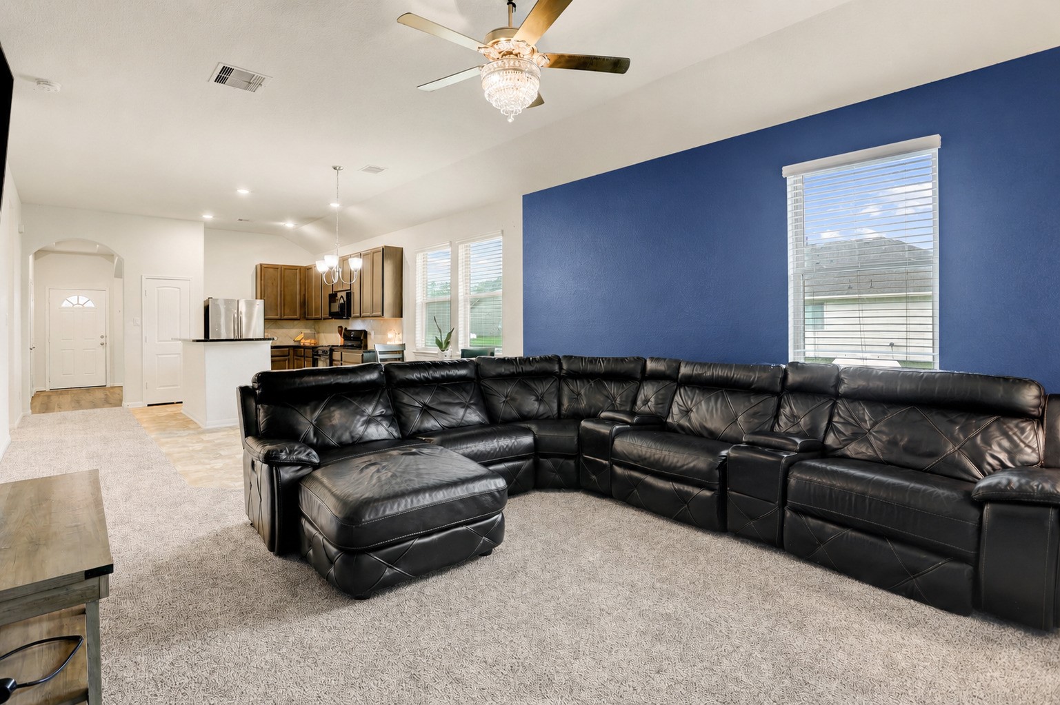 6535 Blimp Base Road Hitchcock, TX 77563 - Photo 14 of 36 There's plenty of space in the living room for a large sectional, as seen here. Get cozy, watch the big game or movies, and relax after a hard day's work.
