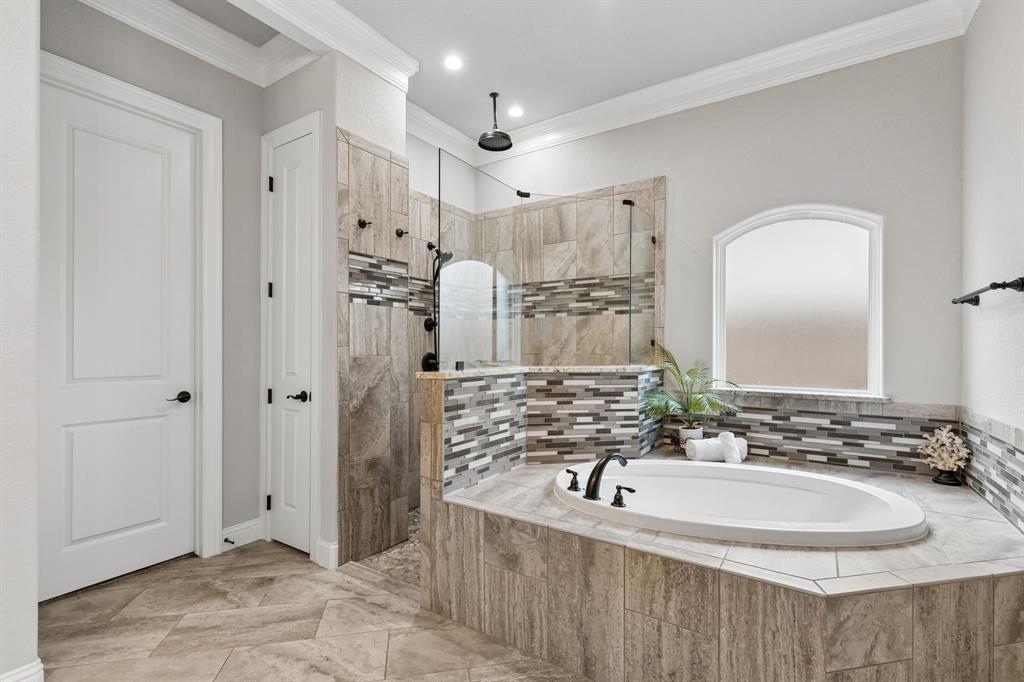 104 Ryder Court Hurst, TX 76053 - Photo 23 of 35 Rain Showerhead In Oversized Walk-In Shower