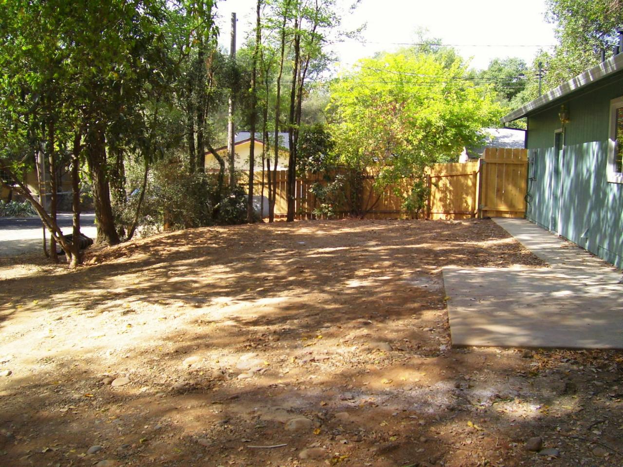 1160 Echo Road Redding, CA 96002 - Photo 4 of 15 a view of a trees in front of a house