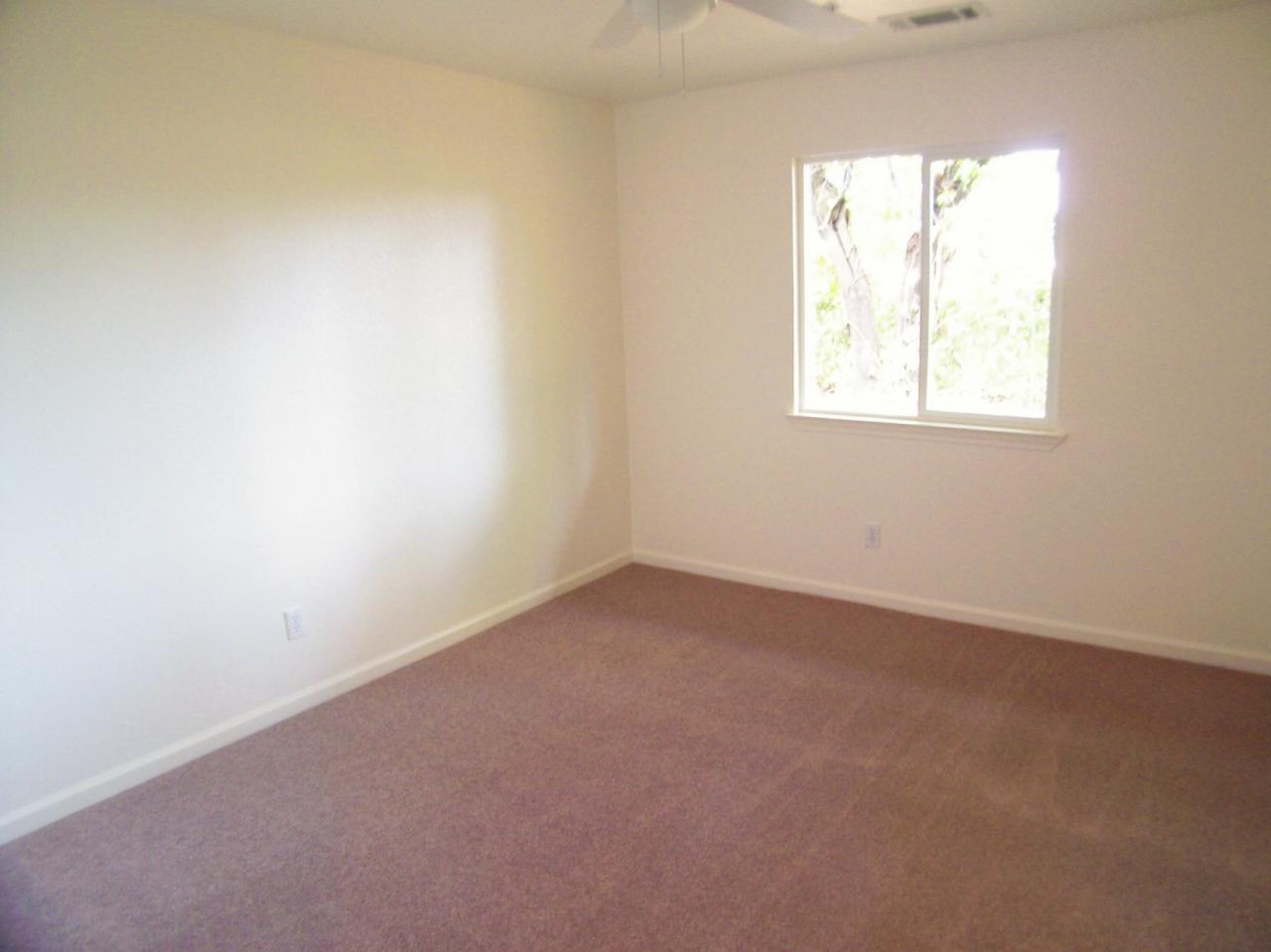 1160 Echo Road Redding, CA 96002 - Photo 9 of 15 an empty room with a window