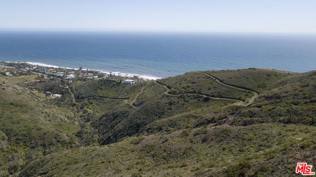 4100 Encinal Canyon Road Malibu, CA 90265 - Photo 16 of 25 an aerial view of house with mountain view