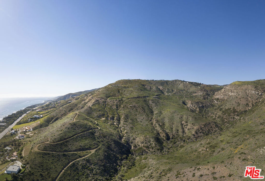4100 Encinal Canyon Road Malibu, CA 90265 - Photo 20 of 25 a view of a large mountain with mountains in the background