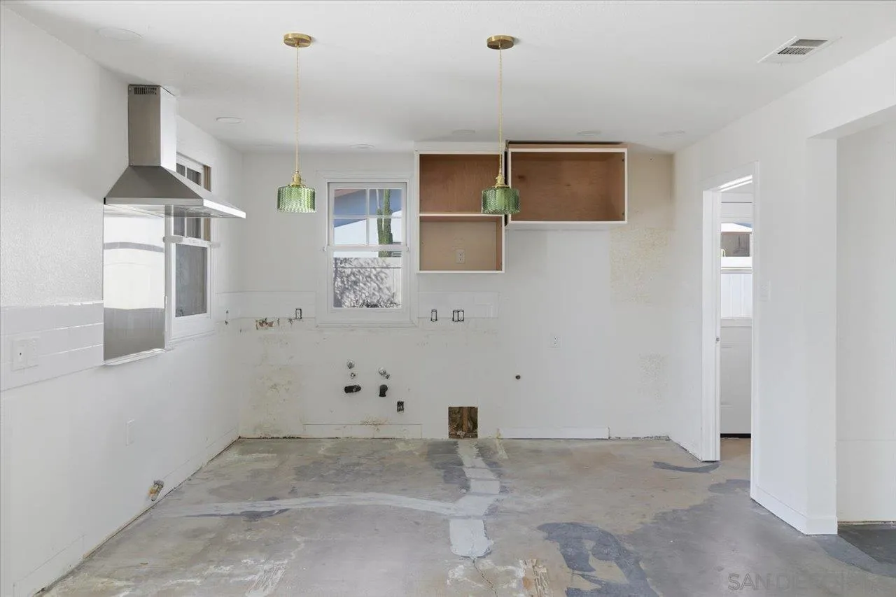 3880 Adams Street Carlsbad, CA 92008 - Photo 12 of 42 a view of kitchen with cabinets