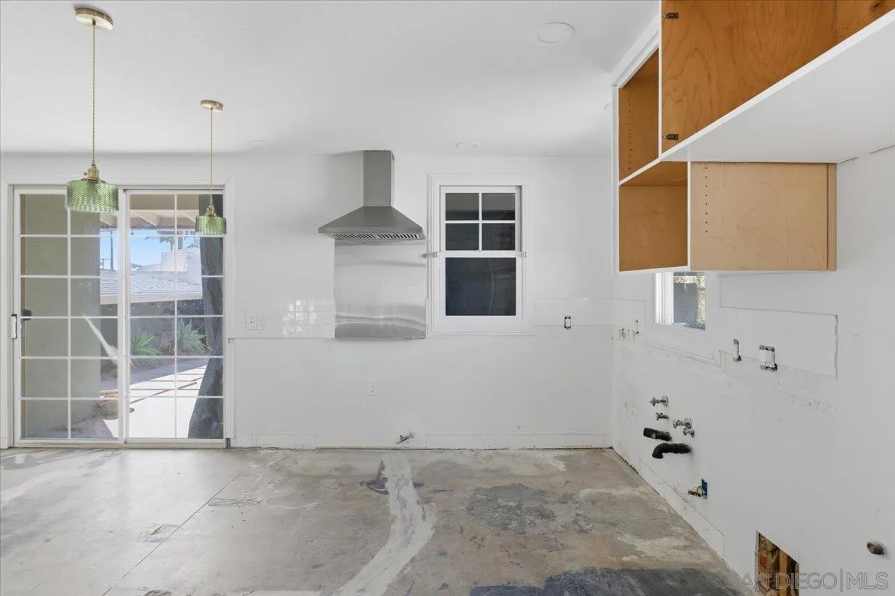 3880 Adams Street Carlsbad, CA 92008 - Photo 14 of 42 a bathroom with a bathtub and shower