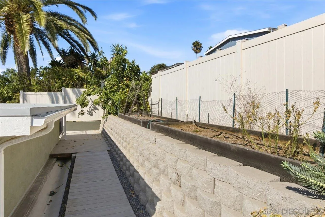 3880 Adams Street Carlsbad, CA 92008 - Photo 26 of 42 a view of a balcony with large trees