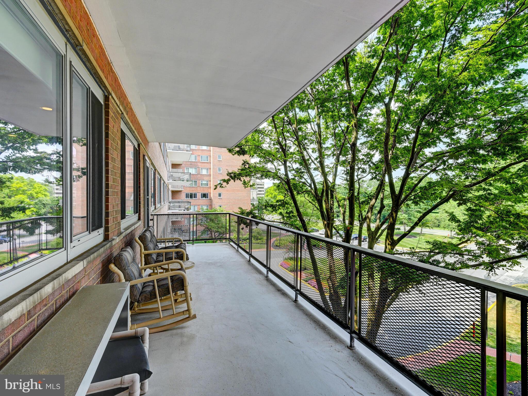 11 Slade Avenue, Unit 410 Pikesville, MD 21208 - Photo 23 of 32 a view of balcony with chairs