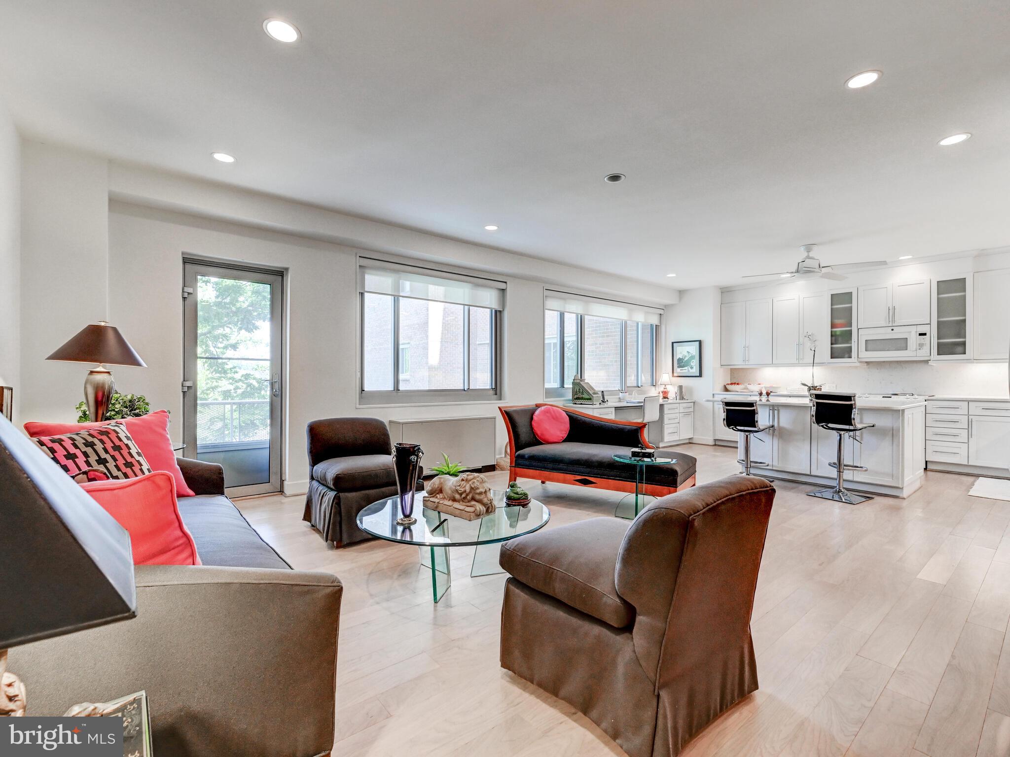 11 Slade Avenue, Unit 410 Pikesville, MD 21208 - Photo 32 of 32 a living room with furniture and a window