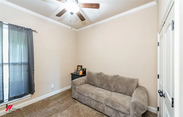 a bathroom with a granite countertop toilet sink and mirror