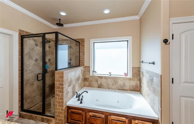 a bedroom with furniture and a mirror