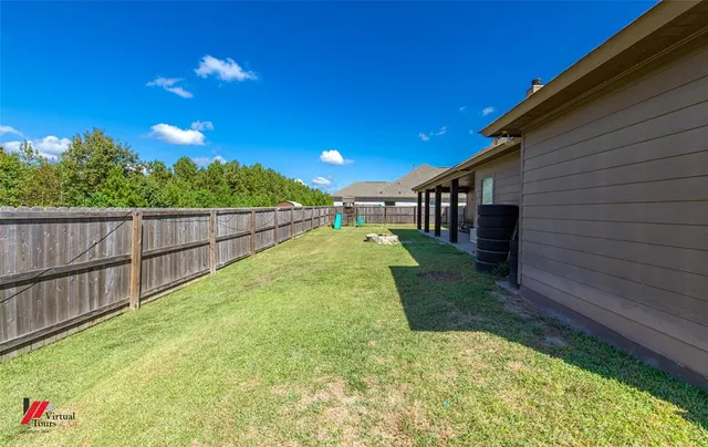a view of swimming pool with an outdoor seating