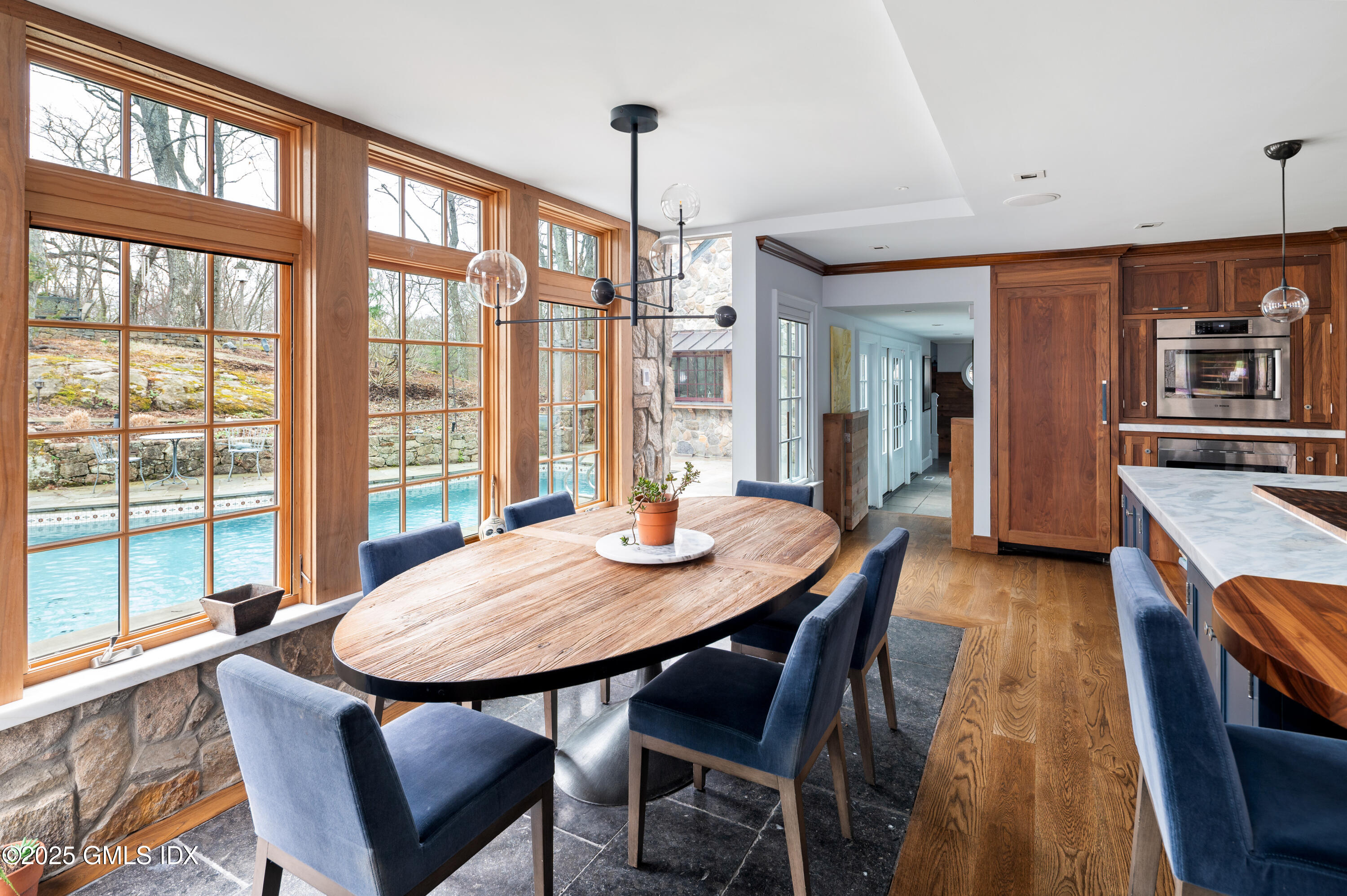 129 Long Close Road Stamford, CT 06902 - Photo 7 of 33 a view of a dining room with furniture window and wooden floor