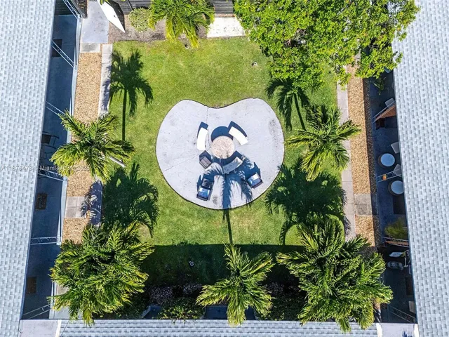 a kitchen with stainless steel appliances granite countertop a stove and a refrigerator