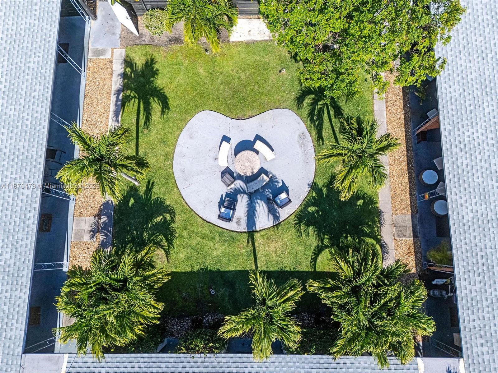 2201 Northeast 14th Avenue, Unit 3 Wilton Manors, FL 33305 - Photo 18 of 27 an aerial view of a swimming pool
