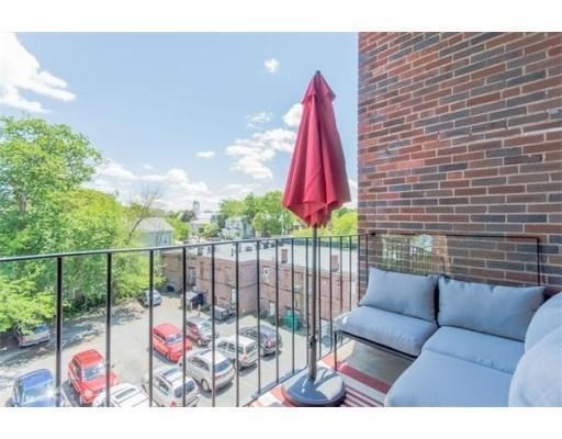 401 Washington Street, Unit 6 Brookline, MA 02446 - Photo 14 of 24 a view of roof deck with furniture