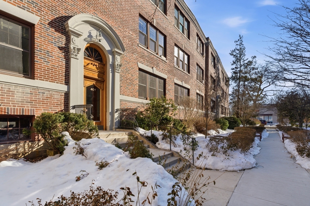 401 Washington Street, Unit 6 Brookline, MA 02446 - Photo 18 of 24 a view of a building with a yard