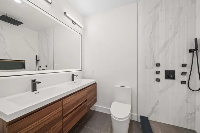 a bathroom with a sink and a toilet