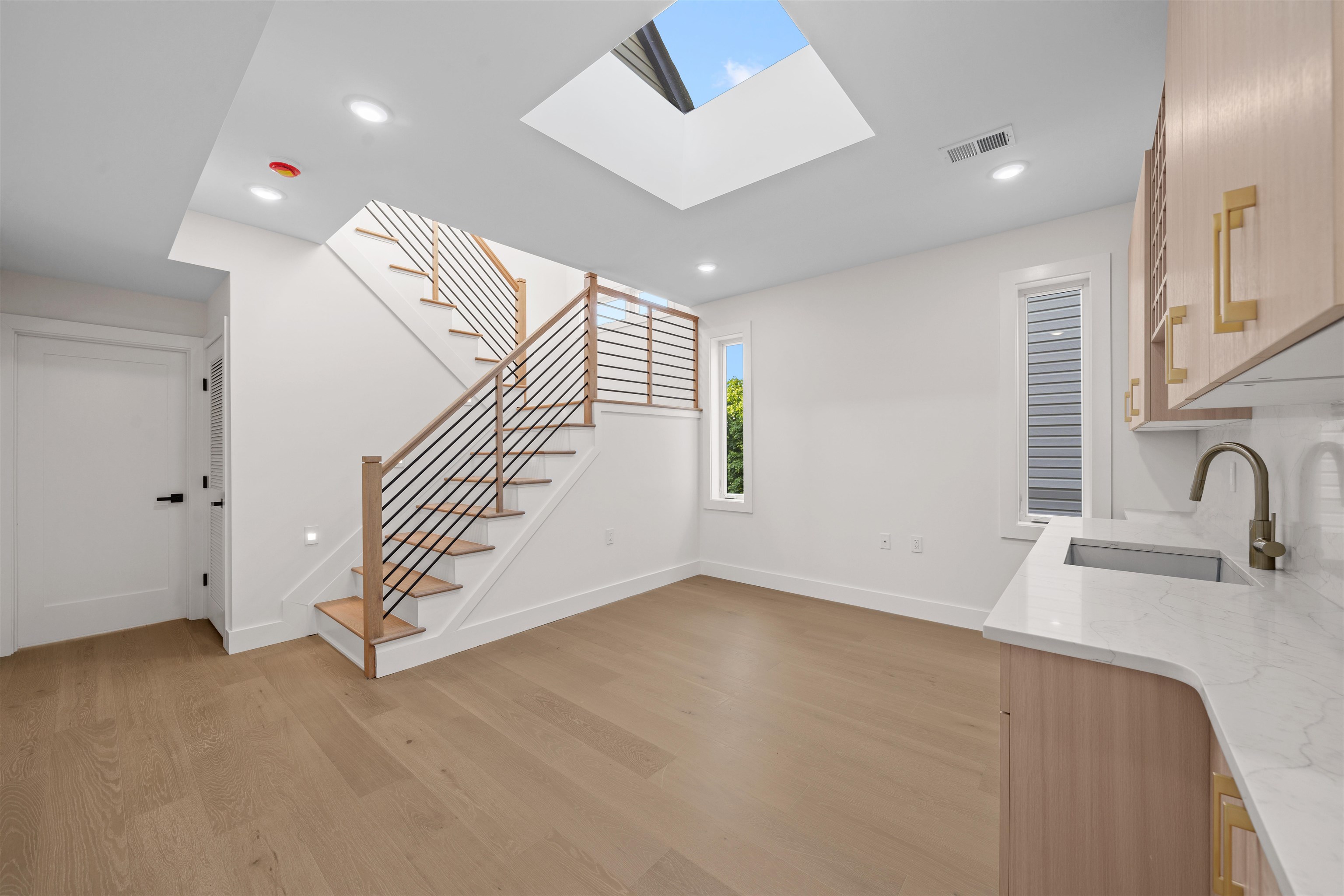 249.5 Halladay Street, Unit 2 Jersey City, NJ 07304 - Photo 23 of 36 a view of a livingroom with a staircase