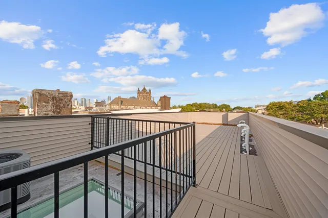 a view of city from a balcony