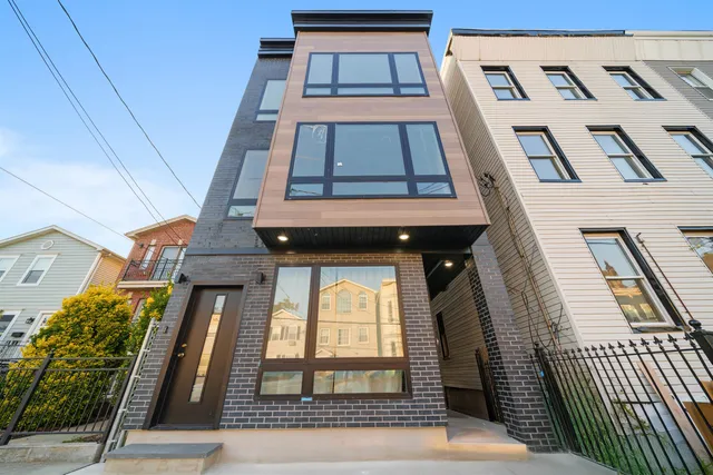 a view of a building from a ceiling fan