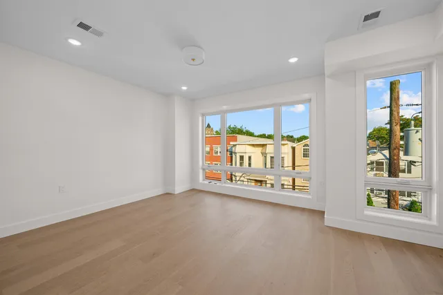 an empty room with windows