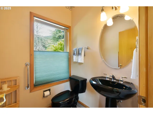 a view of kitchen with furniture and large window